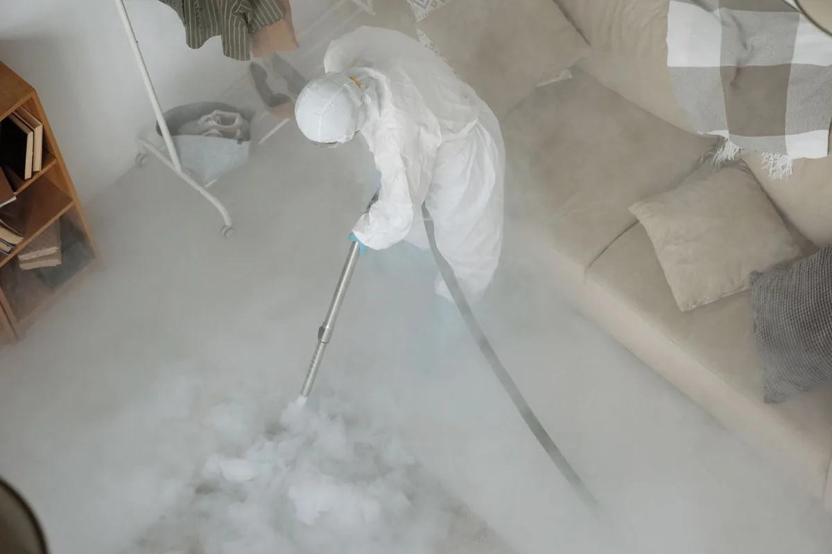 Biohazard cleanup technician in protective equipment, Maynardville, TN